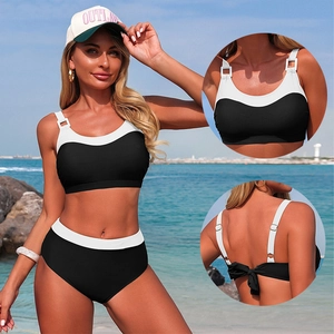 Two-piece black and white high-waisted bikini set with square buckle and tie back details