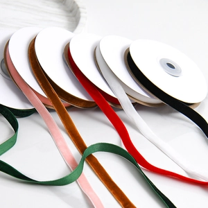 Multiple colors of 1cm velvet ribbon rolls for gift wrapping and DIY crafts