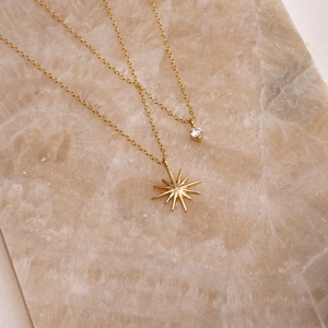 Layered gold 18K plated stainless steel necklace with starburst and zircon charms