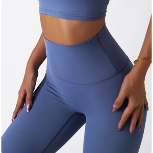Close-up of high-waisted seamless fitness leggings featuring blue stretch fabric