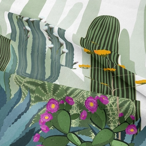 Detailed view of bohemian cactus print fabric texture with vibrant floral patterns