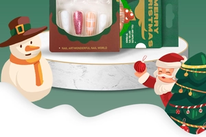 Detailed Christmas press-on nail kit featuring white embossed heart and pink glitter designs