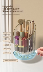 Rotating makeup brush holder with blue base showing internal storage capacity for cosmetics