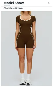 Front view of chocolate brown fitness romper with white piping and high-stretch fabric