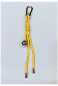 Detail of yellow woven rope keychain with polished silver metal ball pendant and clip