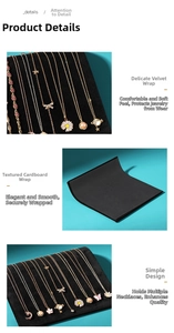 Macro detail of S-shaped black velvet jewelry display stand for necklace presentation