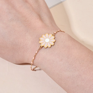 Chic gold stainless steel daisy bracelet with pink enamel charms and beads for women