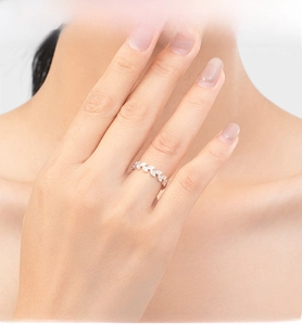 Detailed view of S925 silver leaf ring with pavé micro-inlaid sparkling zircons