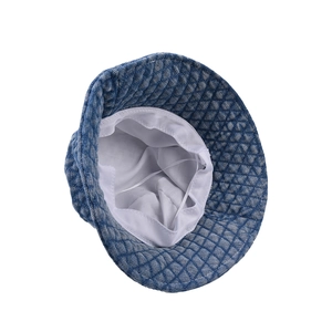 Blue quilted denim bucket hat for kids with warm lining and adjustable drawstring cord