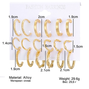 Detailed size chart for a set of 16 gold-plated pearl and hoop earrings on display card