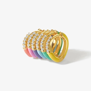 Detail of six colorful rainbow enamel S925 silver hoop earrings with sparkling cubic zirconia