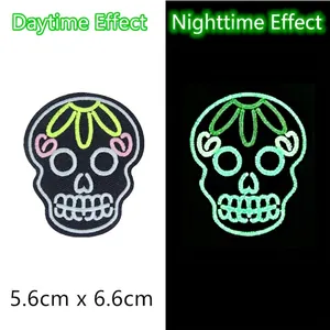 Luminous skull with flowers embroidery patch showing day and night glowing effect
