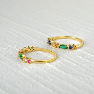 Close-up of S925 sterling silver gold ring with colorful turquoise and zircon stones