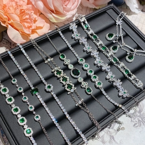 Elegant emerald green gemstone jewelry set with S925 silver and white cubic zirconia