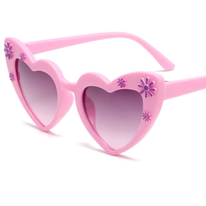 Pink heart-shaped kids sunglasses with purple gradient lenses and 3D floral accents