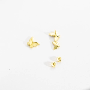 Detail shot of gold S925 sterling silver butterfly stud back with clear hallmark