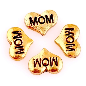Set of four gold heart charms with MOM engraving for modular floating lockets