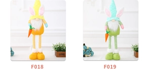 Detail of telescopic Easter gnome dolls with rabbit ears and carrots in yellow and green