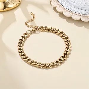 18K gold plated stainless steel Cuban link bracelet with lobster clasp and extender chain