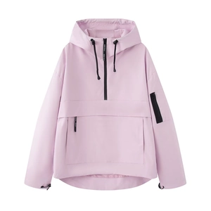 Detailed view of large front pocket and zip detail on the light pink hooded jacket