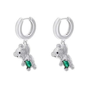 Macro view of silver-tone bear earrings with green teardrop-shaped zircon drop detail