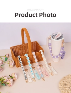 Detail of colorful hand-woven daisy cup lanyards with premium gold metal lobster clasps
