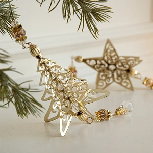 Golden iron Christmas tree and star ornaments with hollow filigree and crystal beads
