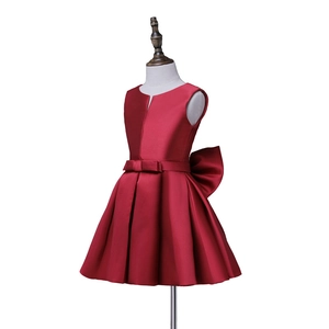 Elegant sleeveless burgundy satin flower girl dress with bow belt and pleated skirt