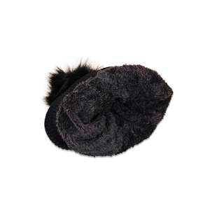 Detailed view of winter knit beanie showing the warm fleece lining and faux fur pompom