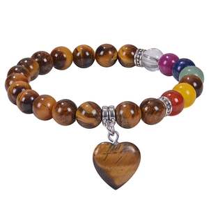 Detail of 8mm tiger eye beads bracelet with seven chakra stones and heart charm
