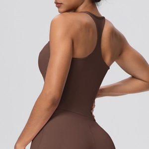 Detailed back view of a brown racerback yoga vest showing seamless elastic fabric