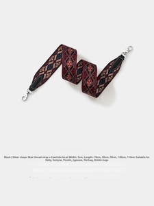 Detail of 5cm wide embroidered strap with wax thread texture and leather ends