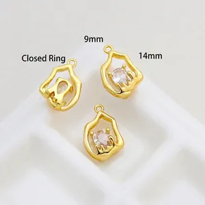 Detail of vintage heart charms with teardrop zirconia in 14x9mm gold plating