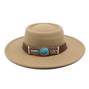 Detailed shot of bohemian felt hat with turquoise stone and vintage woven band decoration