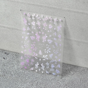 Macro detail of MS-230 rose nail stickers with holographic purple metallic finish