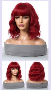 Three-angle view of short wavy red bob wig with bangs on a professional mannequin