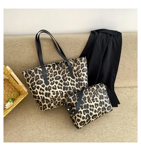 Detailed view of leopard print tote bag set with high-quality PU leather straps