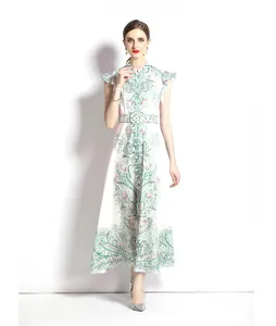 Detail of vintage paisley print dress with a matching waist belt and A-line silhouette