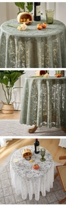 Detail of sage green and white lace tablecloth with elegant ruffled edges and hollow design