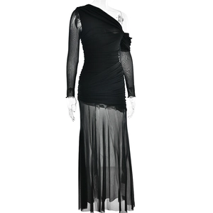 Detail of sheer mesh stitching and ruched fabric on this black one-shoulder long dress