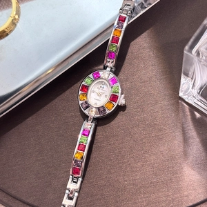 Elegant women's quartz watch with colorful zircon crystals and silver bracelet band