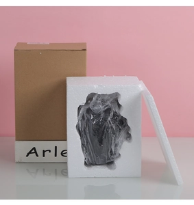 Detailed view of the secure shipping packaging with foam insert for heart vase