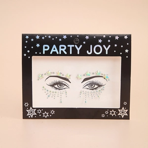 Iridescent star and rhinestone face stickers for eye makeup on pink background