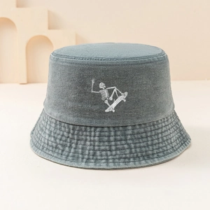 Gray-blue bucket hat with skull skateboard print and vintage washed cotton finish
