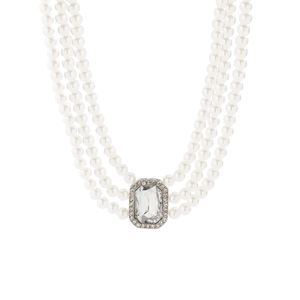Macro detail of triple-layer pearl necklace with a radiant cut crystal pendant charm