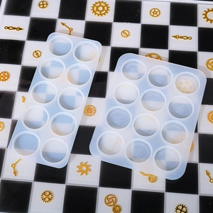 Macro view of 12-hole silicone chess molds with crown and gear patterns for DIY resin