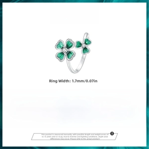 Macro detail of S925 silver clover open ring with green enamel and small diamonds