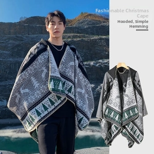 Detailed macro view of men's Christmas reindeer knit pattern on a hooded poncho cape