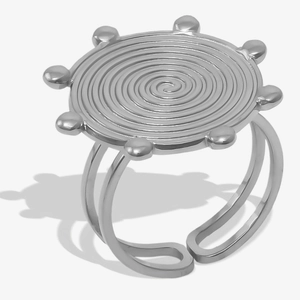 Detailed macro view of 304 stainless steel spiral ring with eight small bead accents