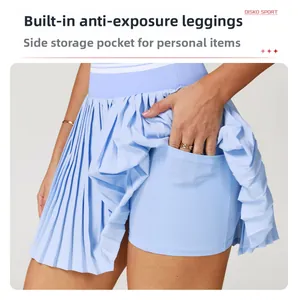 Detail of light blue pleated tennis skirt with built-in liner shorts and side pockets
